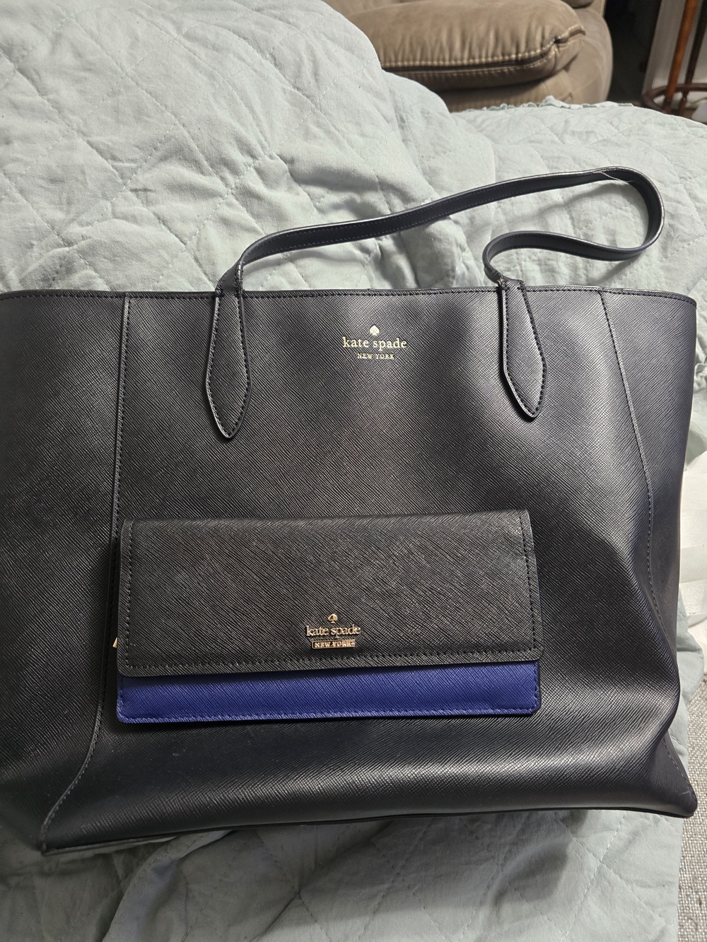 kate spade black leather tote with blue-accent wallet